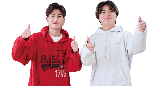 学校独自の授業が充実！笑顔で「いいね！」をする東日本医療専門学校の男子学生2人